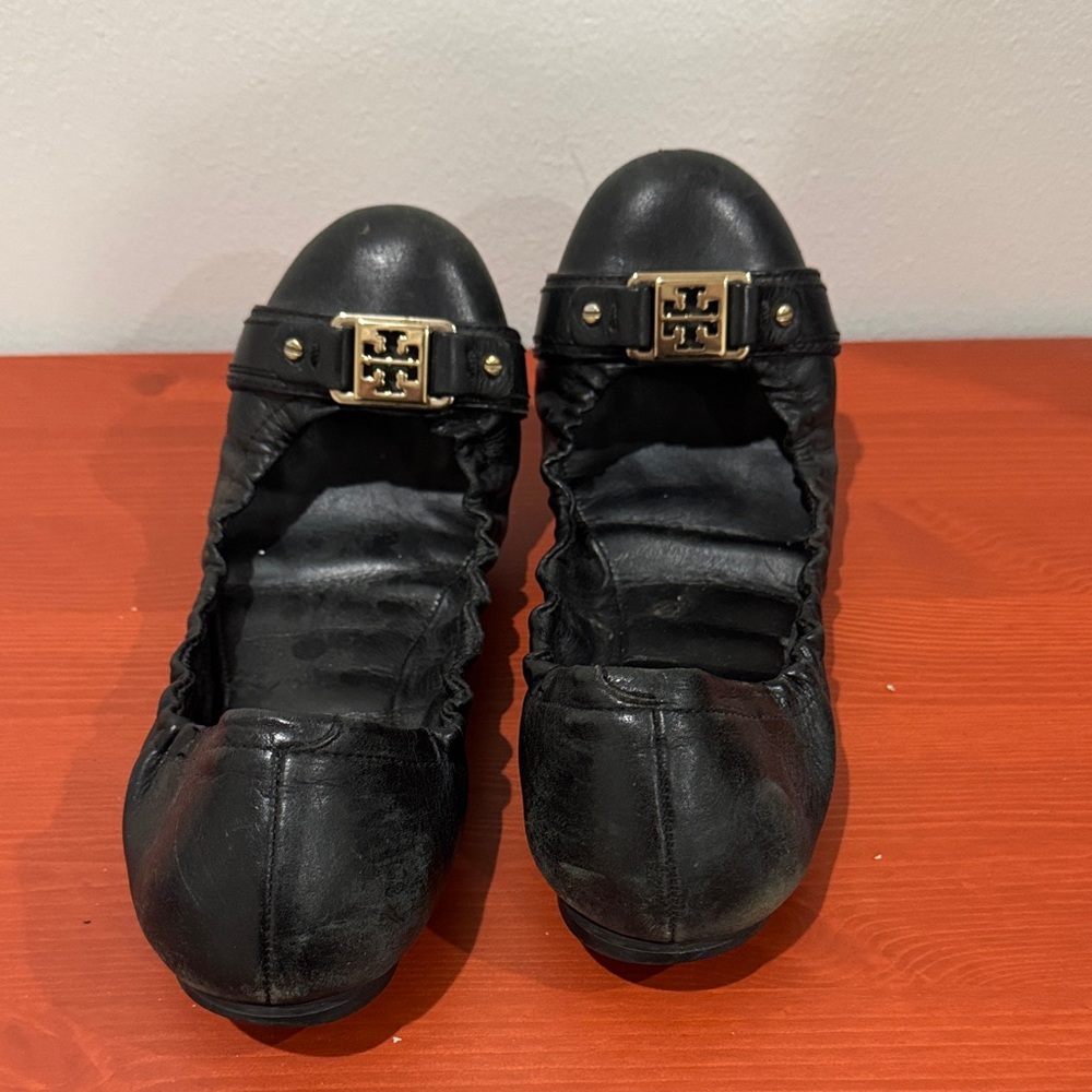 Tory Burch Black Leather Flats with Gold Accents